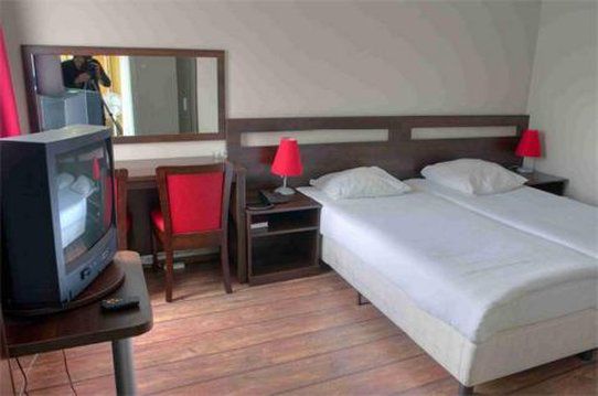 Hotel Damrak Amsterdam Oda fotoğraf